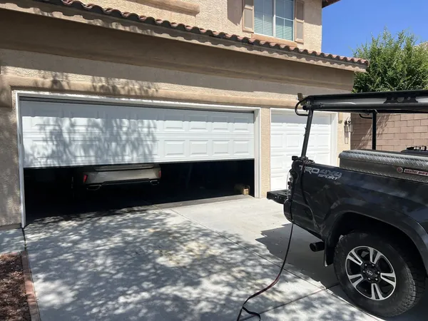 Modern gray garage door on a valley home