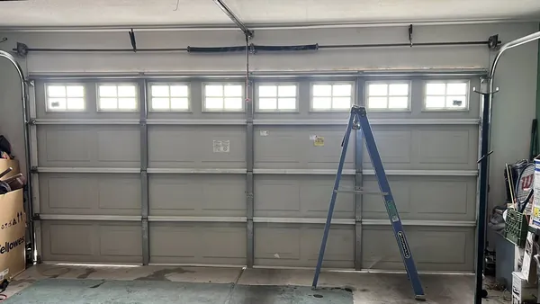 Fresh sectional garage door install, interior tracks