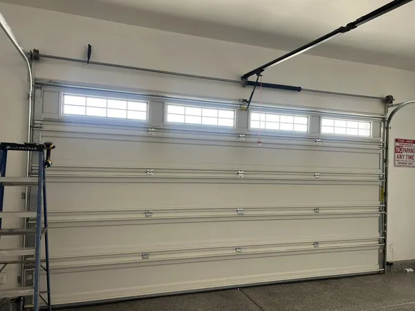 New door sections going up during installation