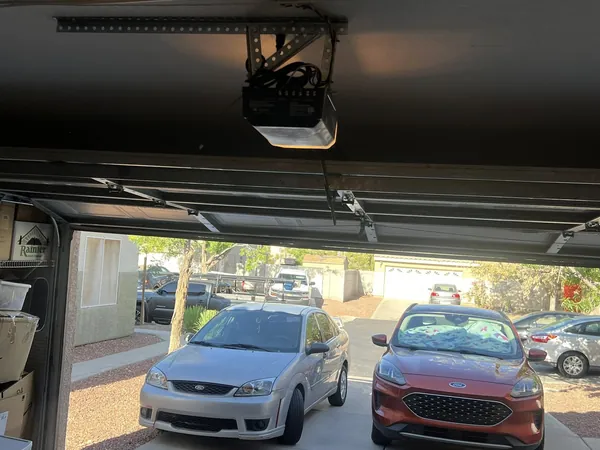 Garage door opener motor head installed